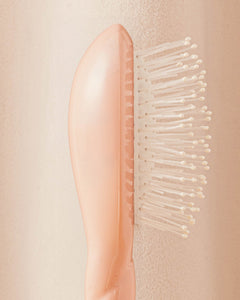 N.04 La Micro Brosse Démêlante & Massante La Miracle Rose Poudré